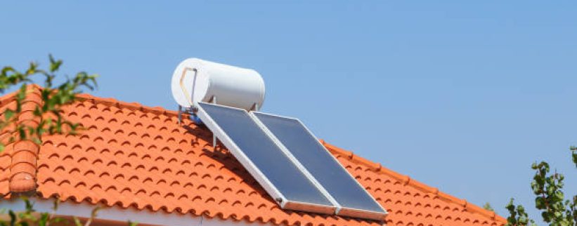 Solar water heating panel and water collector on a house roof